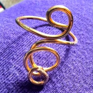 Copper-based wire-wrapped gold, colored wire.